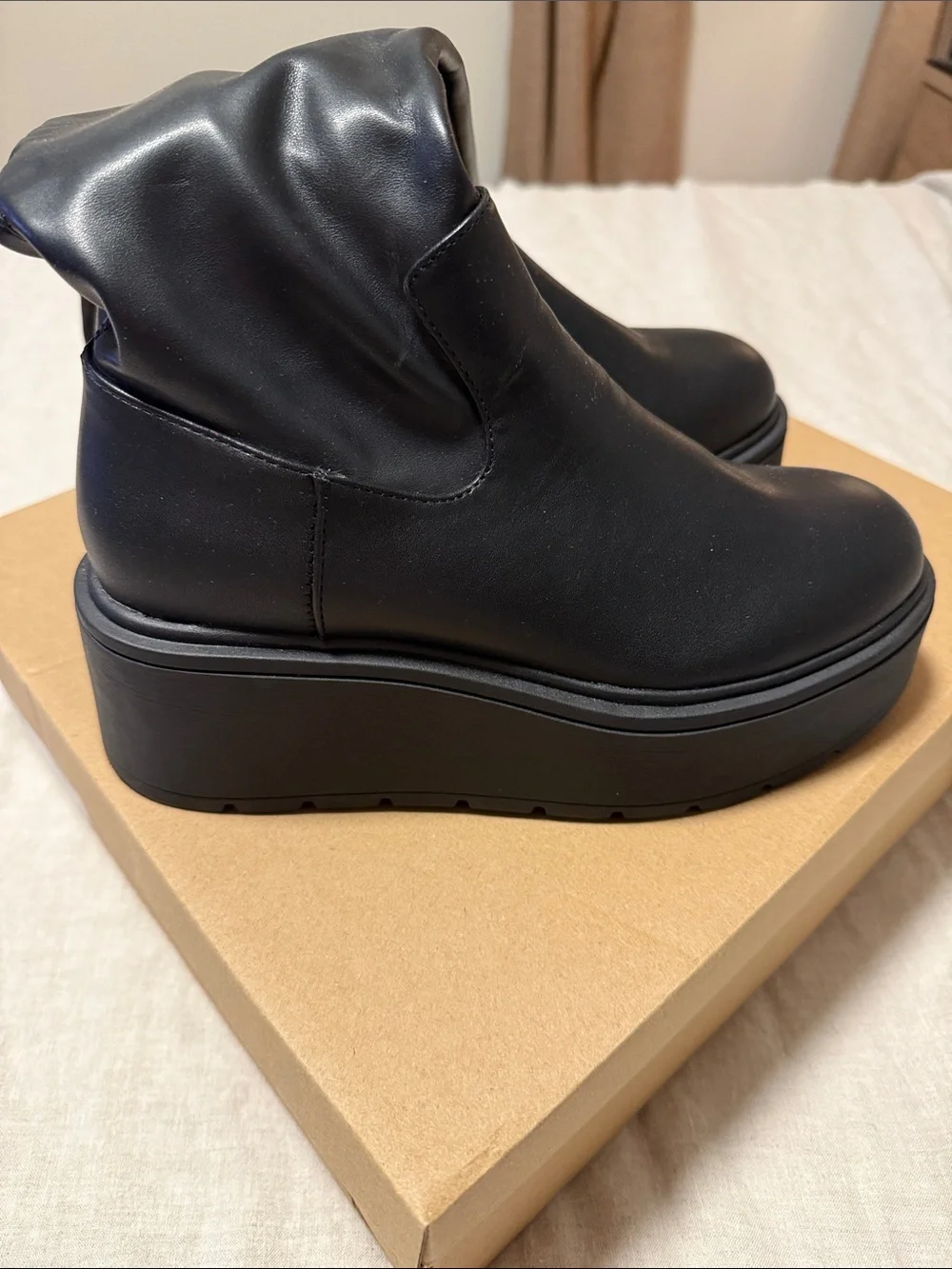Steve Madden Black Platform Slip-On Ankle Boots